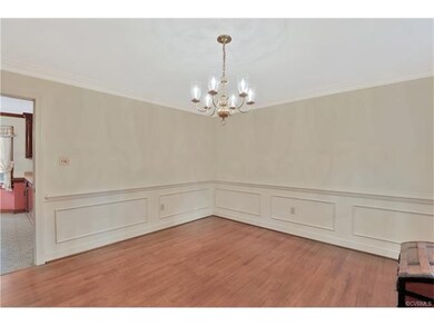 Bright Dining Room with two windows, wood floor, c