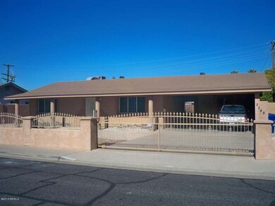 Block Fence with Wrought Iron Gate
