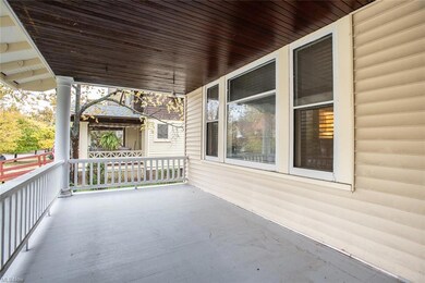 Greet neighbors from the classic Lakewood front porch