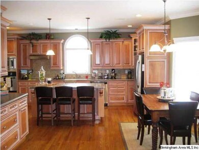Columns open into gracious dining room
