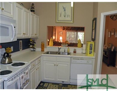 Kitchen. Clean white kitchen with dishwasher & dis