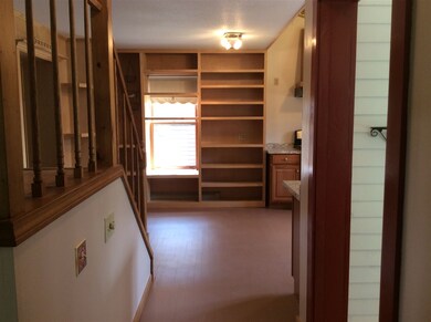 Walk into your kitchen-open shelving for your ease in meal planning.
