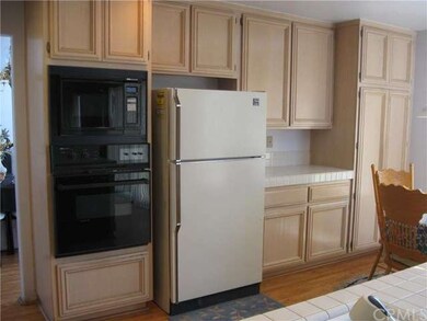 Lots of cabinet space in this cozy eat in kitchen