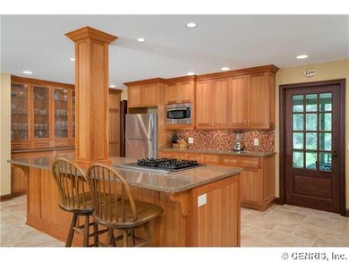 Kitchen. Quartz counter tops...glass tile backspla