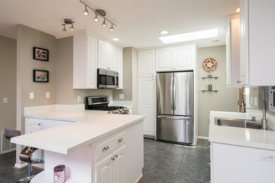 Beautiful quartz counters and stainless appliances