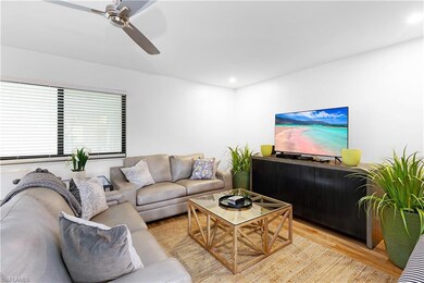 Living room featuring light wood-type flooring and