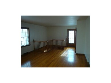 Stairs down to completely finished lower level