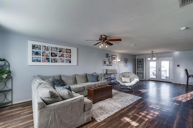 Walking into the home viewing the open space downstairs.