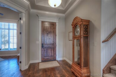 Front door with office on the left. 2 primary suit