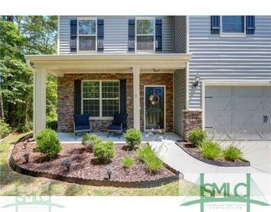 Porch. Lovely Front Porch Offers Seating and/or Di