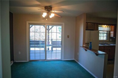 Dining room exits to covered back deck