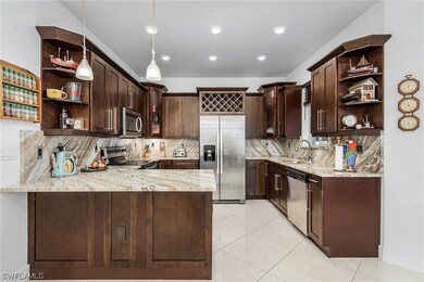 Stainless appliances in loaded kitchen