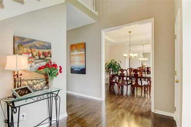 Lovely Entry & Dining Room with brand new hardwood