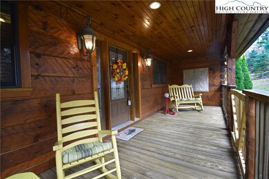 Front Porch with seasonal mountain view across street...homesite is vacant