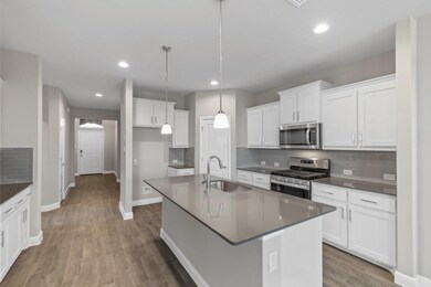 Kitchen -- All Home and community information, including pricing, included features, terms, availability and amenities, are subject to change at any time without notice or obligation. All Drawings, pictures, photographs, video, square footages, floor