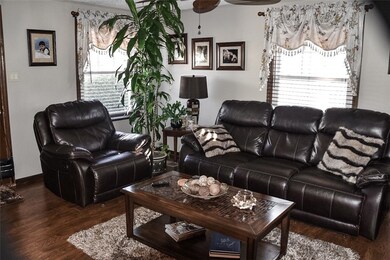 The living room is spacious in size, features lots