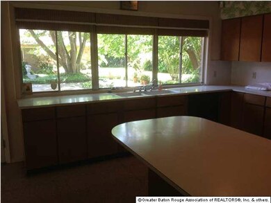 Kitchen view of beautiful patio and backyard