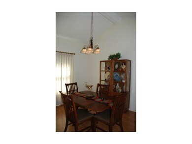 Dining Room with Vaulted Ceiling