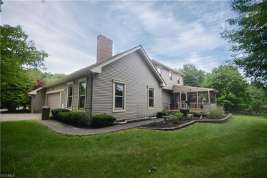 Back of the home, showing the outside deck and flo