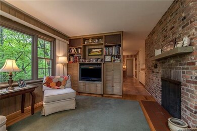 Den leading out to Kitchen on right side.