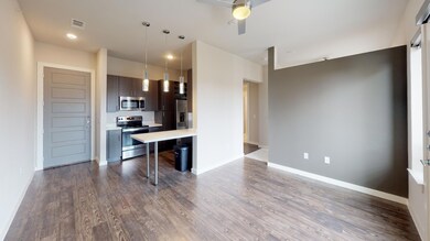Kitchen featuring ceiling fan, a kitchen breakfast