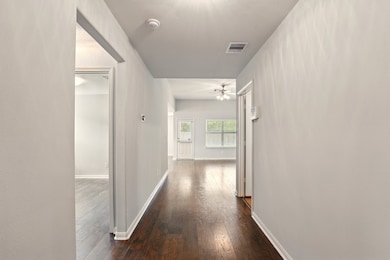As you enter the home, you are greeted by a long h