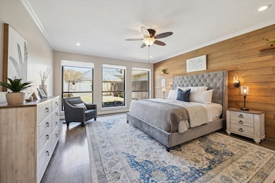 The remodeled first-floor primary suite is a priva