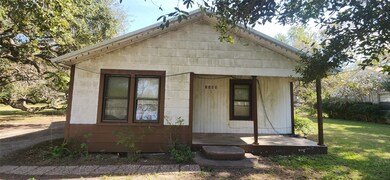 Front of home with small concrete porch