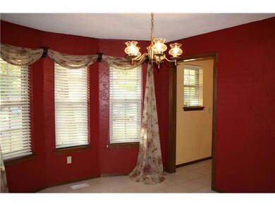 Dining Room. Lots of natural light with three wind