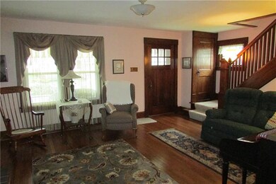 Beautiful living room. Oak floors and woodwork.