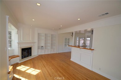 Living room looks into the kitchen/dining areas