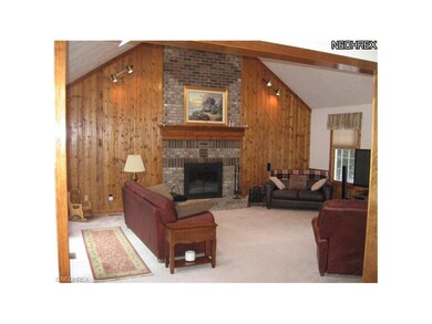 Family Room with floor to ceiling Fireplace.  Ther