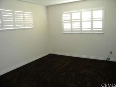 MASTER BEDROOM WITH NEW CARPET. PLANTATION SHUTTER