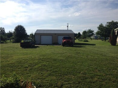 Another look at the large back yard and 2 car gara