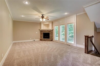 Your great room provides scenic views of the woode