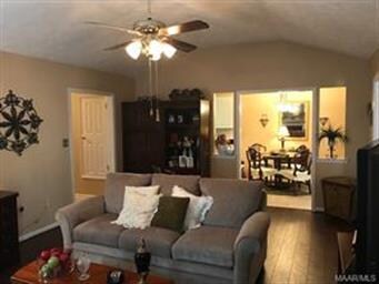 Living Room with vaulted ceiling, opens to breakfa