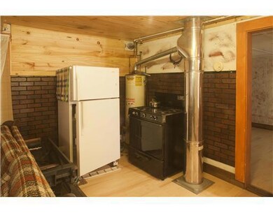 Exterior Front. Fridge and gas cook...