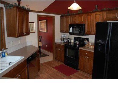 KITCHEN WITH TILE FLOORS AND ALL APPLIANCES REMAIN