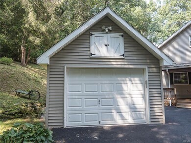 1 car, over-sized detached garage