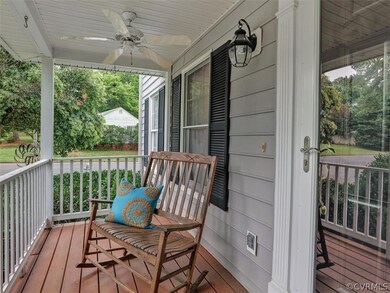 Charming Front Porch with 2 Ceiling Fans