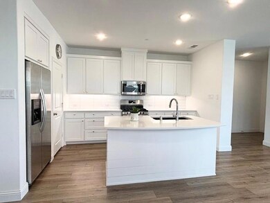 Kitchen featuring appliances with stainless steel 