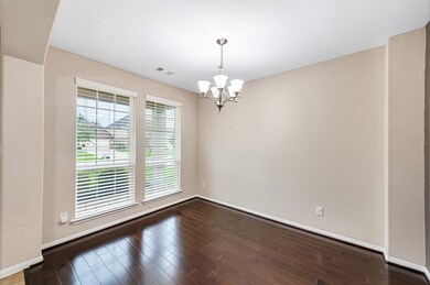 The formal dining room provides the perfect place for entertaining your guests.