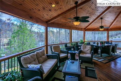 Screened in deck overlooking the lake!