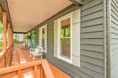 Welcome home, freshly painted country front porch.