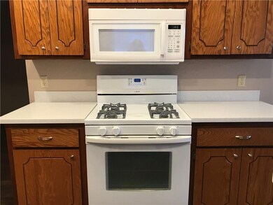 Gas stove.  Built in  microwave.  Solid surface co