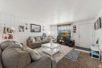 Living area with a textured ceiling