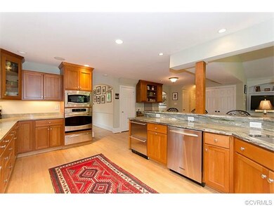 Kitchen with granite and stainless appliances