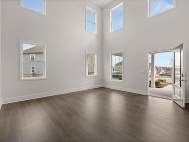 Westerly front foyer with multiple windows for abundant natural light