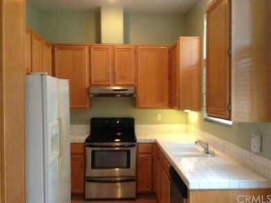 Cheery kitchen with lots of natural light and stai