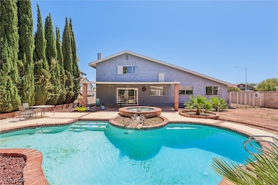 View of swimming pool featuring a patio, ceiling f